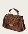 Brown bovine top handle handbag Online now